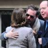 Chris O'Neill embrasse sa belle-mère la reine Silvia. Le roi Carl XVI Gustaf (pas présent sur la photo) et la reine Silvia de Suède ont félicité leur gendre Chris O'Neill pour la naissance de son premier enfant avec leur fille la princesse Madeleine, et ont déjeuné avec lui au restaurant huppé Amaranth, le 23 février 2014 à New York.