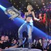 Rita Ora, ultrasexy en soutien-gorge, jean et bottes en cuir lors de l'after-show party Phillip Plein. Milan, le 23 février 2014.