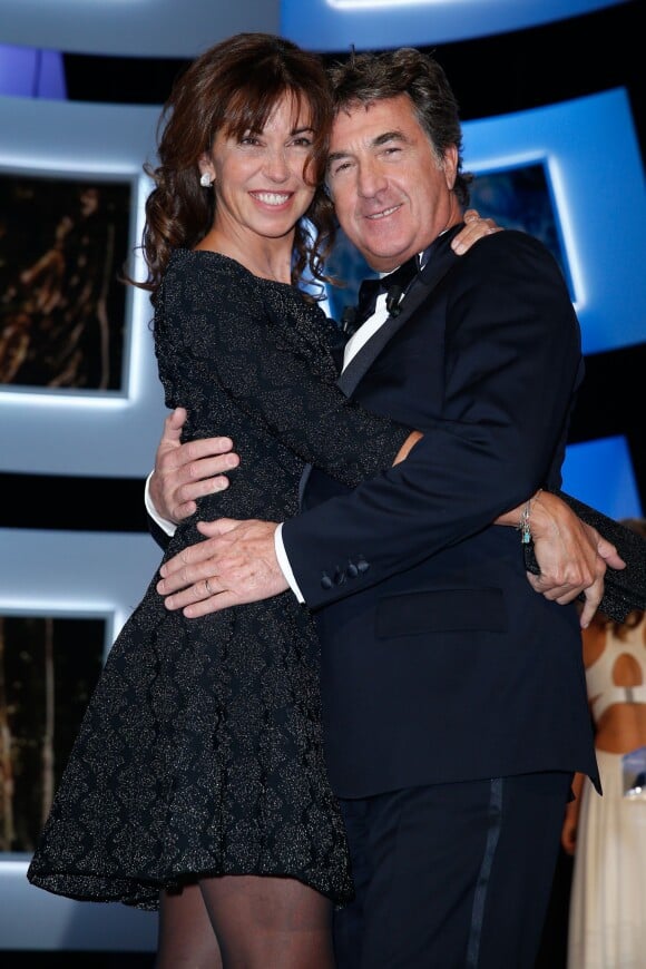 François Cluzet et sa femme Narjiss sur la scène de la cérémonie des César le 28 février 2014