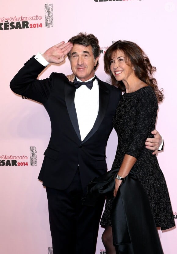 François Cluzet et sa femme Narjiss au photocall de la cérémonie des César le 28 février 2014