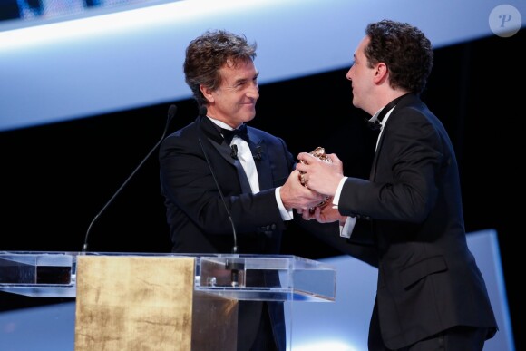 François Cluzet, président, remet à Guillaume Gallienne le César du Meilleur Film à Paris le 28 février 2014