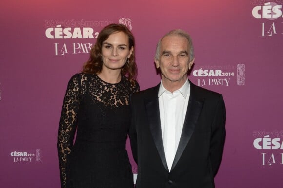 Alain Terzian, président de l'Académie des César, et sa femme, lors de la soirée La Party des César au VIP Room le 28 février 2014