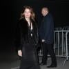 Laetitia Casta arrive à la Halle Freyssinet pour assister au défilé Givenchy. Paris, le 2 mars 2014.