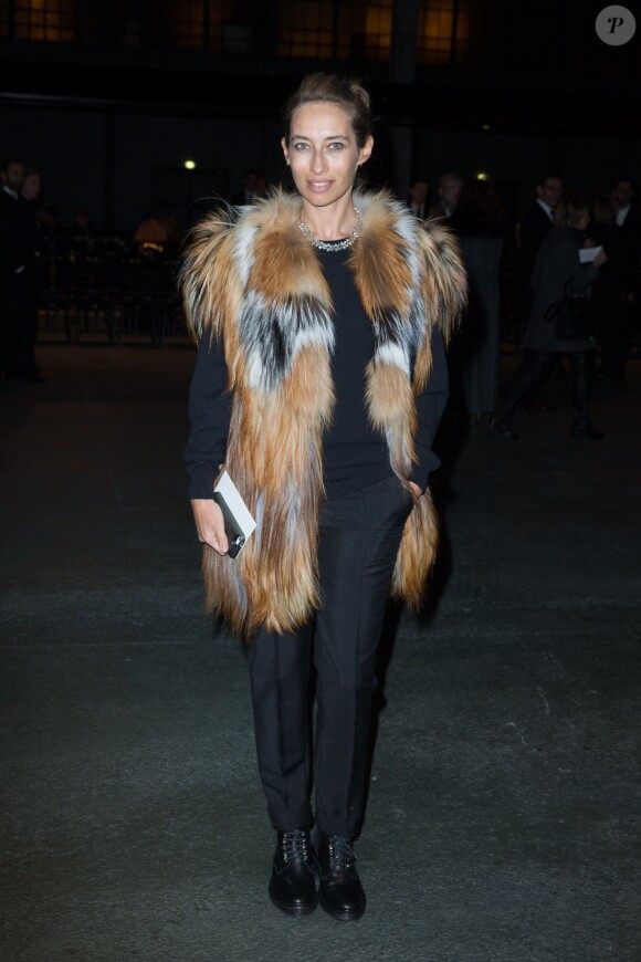 Alexandra Golovanoff arrive au défilé Givenchy automne-hiver 2014-15, à la Halle Freyssinet. Paris, le 2 mars 2014.