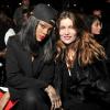 Rihanna et Laetitia Casta assistent au défilé Givenchy automne-hiver 2014-15, à la Halle Freyssinet. Paris, le 2 mars 2014.