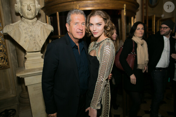 Mario Testino et le top model Arizona Muse assistent à la soirée du magazine Vogue Deutsch, au 1728. Paris, le 1er mars 2014.