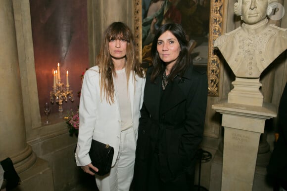 Caroline de Maigret et Emmanuelle Alt assistent à la soirée du magazine Vogue Deutsch en l'honneur de Mario Testino, au 1728. Paris, le 1er mars 2014.