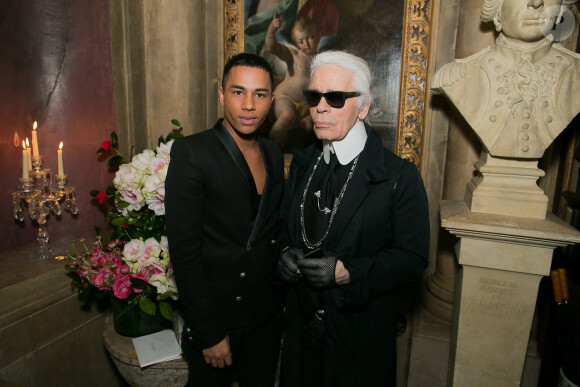 Olivier Rousteing et Karl Lagerfeld assistent à la soirée du magazine Vogue Deutsch en l'honneur de Mario Testino, au 1728. Paris, le 1er mars 2014.