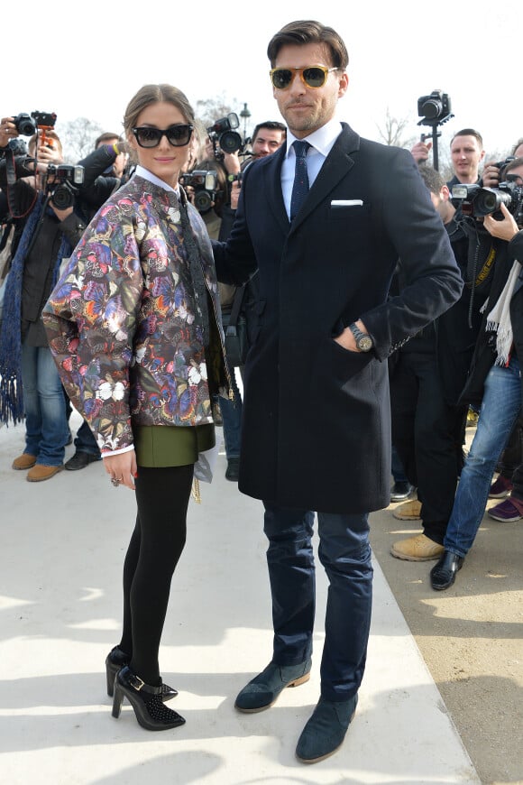 Olivia Palermo et son fiancé Johannes Huebl arrivent au jardin des Tuileries pour assister au défilé Valentino prêt-à-porter automne-hiver 2014/2015. Paris, le 4 mars 2014.