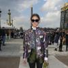 Olivia Palermo arrive au jardin des Tuileries pour assister au défilé Valentino prêt-à-porter automne-hiver 2014/2015. Paris, le 4 mars 2014.