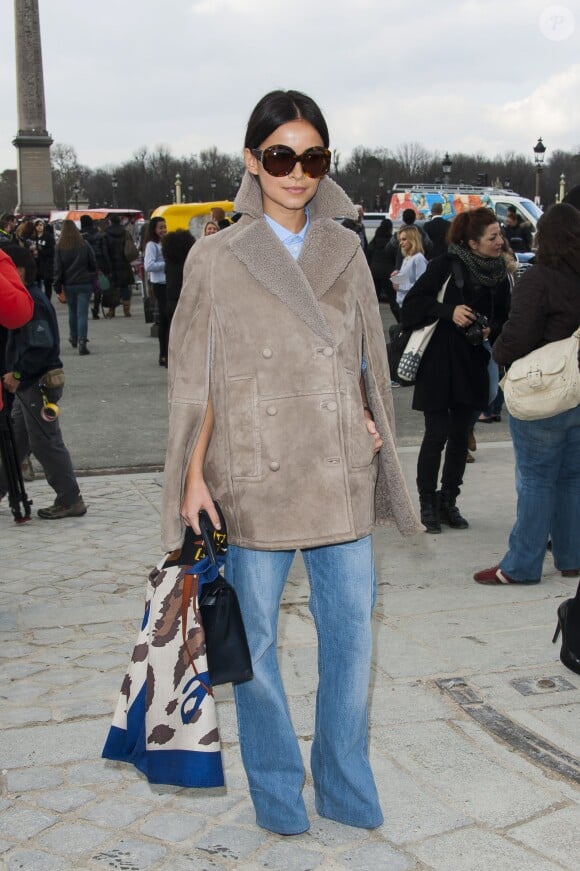 Miroslava Duma arrive au jardin des Tuileries pour assister au défilé Valentino prêt-à-porter automne-hiver 2014/2015. Paris, le 4 mars 2014.