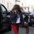 Cara Delevingne, de retour à son domicile avec Michelle Rodriguez. Londres, le 6 mars 2014.