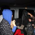 Cara Delevingne, Michelle Rodriguez et les jumeaux Larry et Laurent Bourgeois (Les Twins) quittent le Chinawhite. Londres, le 6 mars 2014.