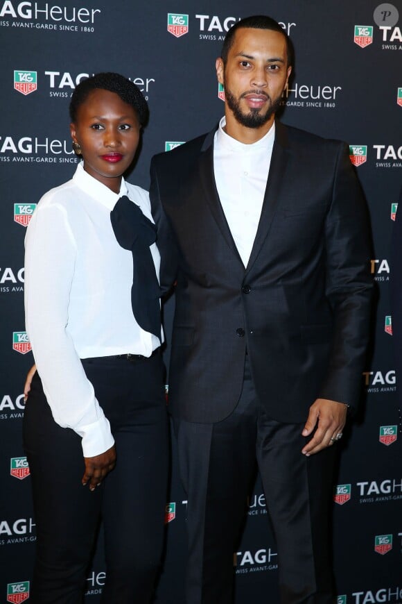 Disiz la Peste et son épouse Thioubado - Photocall de la soiree TAG Heuer qui celebre le 50eme anniversaire de son icone, la CARRERA, au pavillon Vendome a Paris, le 6 novembre 2013.