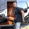 Kanye West, surpris à la descente d'un hélicoptère à Rio de Janeiro. Le 9 mars 2014.