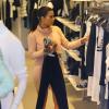 Kim Kardashian, en pleine séance shopping à Miami, le 12 mars 2014.