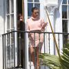 Kim Kardashian, sur le balcon de sa chambre à la Casa Casuarina (plus connue sous le nom de Villa Versace). Miami, le 12 mars 2014.