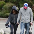 Exclusif - Ashton Kutcher et sa fiancée Mila Kunis promènent leurs chiens à Los Angeles. Le 01 Mars 2014.