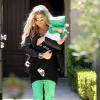 Fergie et son mari Josh Duhamel sortent de chez eux avec leur fils Axl pour se rendre chez des amis à l'occasion de la Saint-Patrick à Brentwood, le 16 mars 2014.