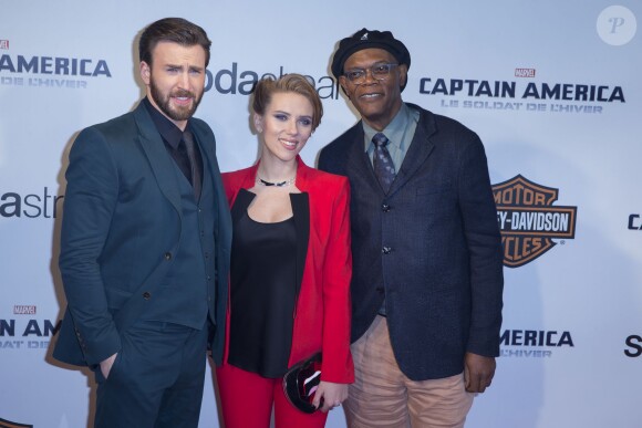 Chris Evans, Scarlett Johansson enceinte et Samuel L. Jackson à l'avant-première du film Captain America : Le Soldat de l'Hiver au Grand Rex à Paris, le 17 mars 2014.