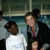 Michèle Laroque lors d'une journée avec l'association "Enfant Star & Match" au Tennis Club de Paris le 17 mars 2014