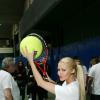 Tatiana Laurens-Delarue lors d'une journée avec l'association "Enfant Star & Match" au Tennis Club de Paris le 17 mars 2014