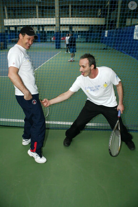 Pascal Sellem lors d'une journée avec l'association "Enfant Star & Match" au Tennis Club de Paris le 17 mars 2014