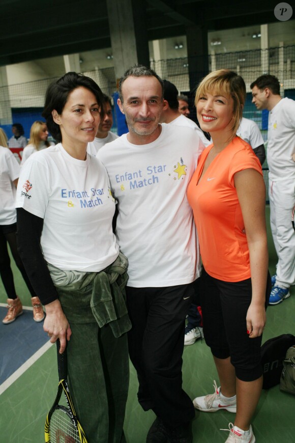 Delphine de Turckheim, Pascal Sellem et Eléonore Boccara lors d'une journée avec l'association "Enfant Star & Match" au Tennis Club de Paris le 17 mars 2014