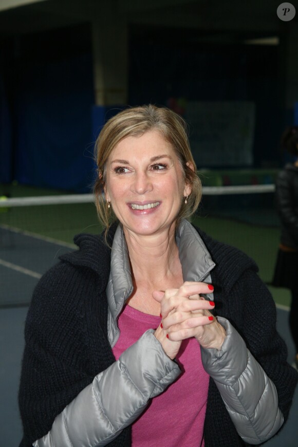 Michèle Laroque lors d'une journée avec l'association "Enfant Star & Match" au Tennis Club de Paris le 17 mars 2014