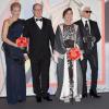 Charlene et Albert de Monaco, Caroline de Hanovre et Karl Lagerfeld lors du Bal de la Rose à Monaco le 29 mars 2014