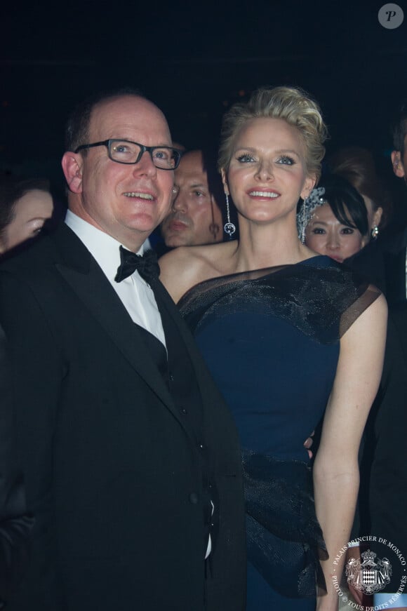 Le prince Albert et la princesse Charlene lors du Bal de La Rose de Monaco le 29 mars 2014