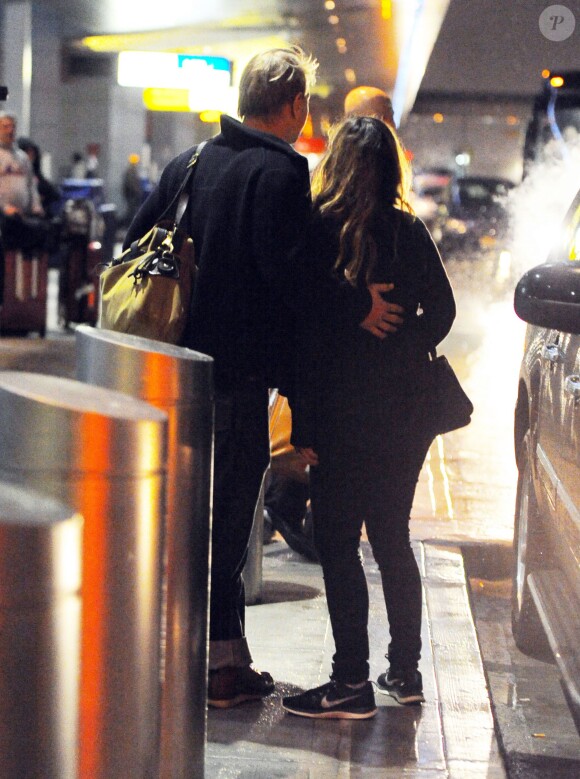 Jade Jagger (enceinte) et son mari Adrian Fillary à l'aéroport JFK de New York, le 29 mars 2014.
