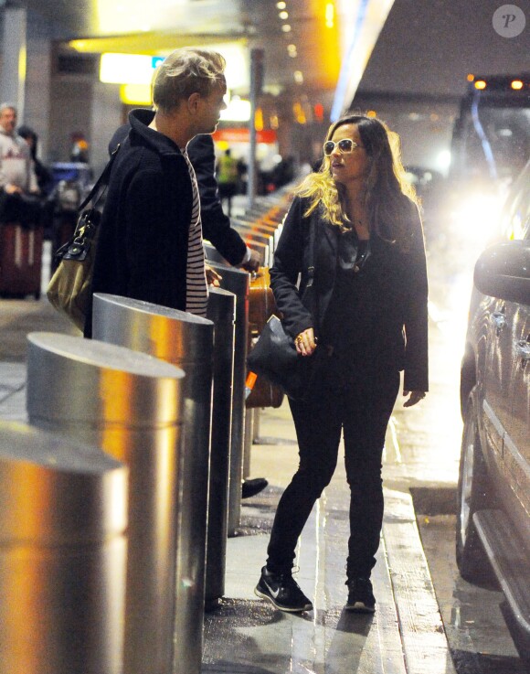Jade Jagger (enceinte) et son mari Adrian Fillary arrivent à l'aéroport JFK de New York, le 29 mars 2014.