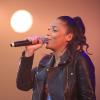 La chanteuse Zaho lors du spectacle "Une nuit à Makala" au Zénith de Lille, le 31 mars 2014, organisé par le joueur de football Rio Mavuba au profit de l'Association "Les Orphelins de Makala"