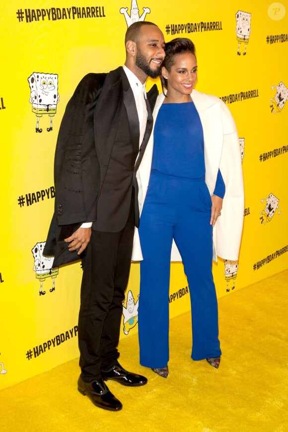Swizz Beatz et Alicia Keys assistent à la soirée d'anniversaire de Pharrell Williams au Cipriani Wall Street. New York, le 4 avril 2014.