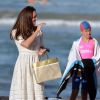Kate Middleton, en robe Zimmermann, et le prince William rencontraient les sauveteurs de la plage de Manly, au nord de Sydney, le 18 avril 2014, au 3e jour de leur tournée en Australie.