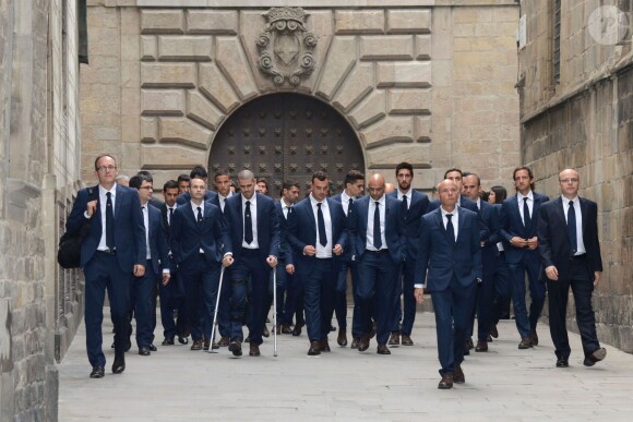 Andrés Iniesta, Víctor Valdés, Xavi et les joueurs du FC Barcelone lors des obsèques de leur ancien coach Tito Vilanova, en la cathédrale de Barcelone le 28 avril 2014