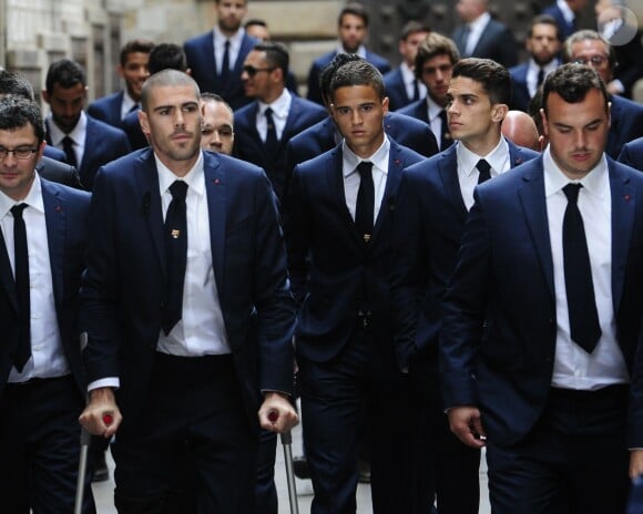 Victor Valdes et ses coéquipiers lors des obsèques de Tito Vilanova l'ex-entraîneur du Barça, en la cathédrale de Barcelone le 28 avril 2014