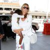 Heidi Klum arrive à l'aéroport de Los Angeles avec sa fille Lou. Los Angeles, le 4 mai 2014.