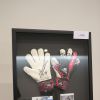 Exclusif - Les gants de Steve Mandanda - Dîner de Gala de l'OM et vente aux enchères animée par Kad Merad et Alice Pol au profit de l'association "les toiles enchantées' à l'hôtel Intercontinental de Marseille, le 6 mai 2014.