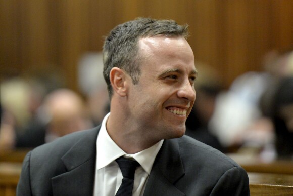 Oscar Pistorius lors d'une audience au tribunal de Pretoria le 3 mars 2014 où il doit répondre du meurtre de Reeva Steenkamp, sa compagne