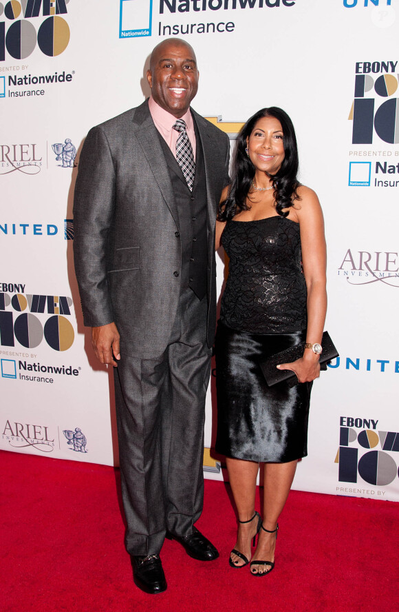 Magic Johnson et son épouse Cookie Johnson lors du gala Ebony Power 100 au Frederick P. Rose Hall, Jazz au Lincoln Center de New York le 4 novembre 2013