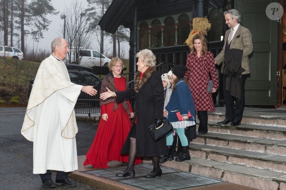 La princesse Märtha-Louise, son époux Ari Behn et leurs filles les princesses Maud, Leah et Emma lors de la messe de Noël à Oslo, le 25 décembre 2013 à l'église d'Holmenkollen