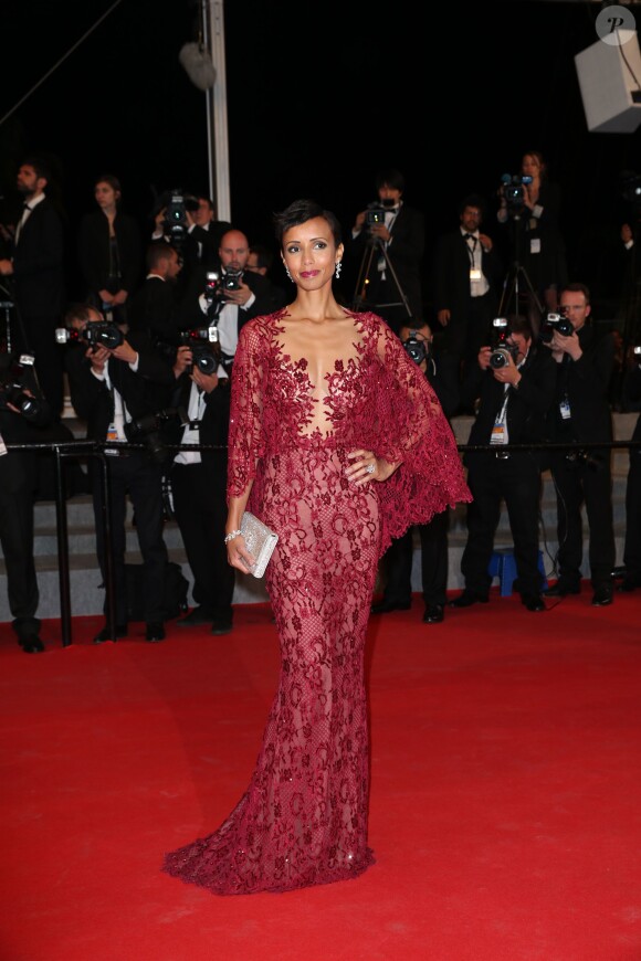 Sonia Rolland (Boucles d'oreilles, bague et bracelet Montblanc collection Princesse Grace de Monaco Pétales de Rose en or blanc et diamants) lors de la montée des marches du film Timbuktu au 67e Festival de Cannes, le 15 mai 2014.