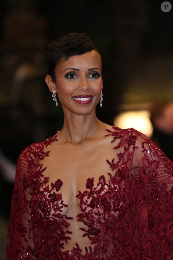 Sonia Rolland (Boucles d'oreilles, bague et bracelet Montblanc collection Princesse Grace de Monaco Pétales de Rose en or blanc et diamants) lors de la montée des marches du film Timbuktu au 67e Festival de Cannes, le 15 mai 2014.