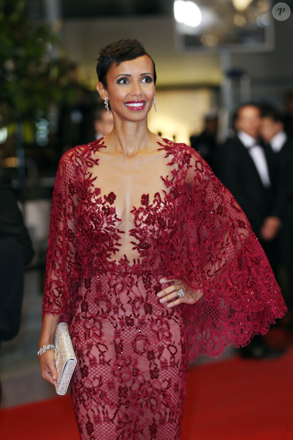 Sonia Rolland (Boucles d'oreilles, bague et bracelet Montblanc collection Princesse Grace de Monaco Pétales de Rose en or blanc et diamants) lors de la montée des marches du film Timbuktu au 67e Festival de Cannes, le 15 mai 2014.