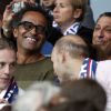 Pierre Sarkozy, Yannick Noah et Smain assistent au match Psg-Montpellier au Parc des Princes à Paris, le 17 mai 2014 