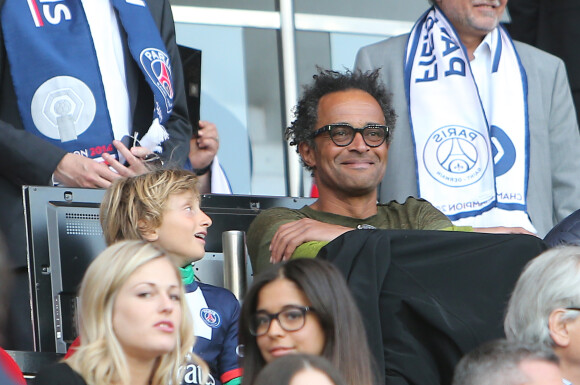 Yannick Noah et son fils Joalukas assistent au match Psg-Montpellier au Parc des Princes à Paris, le 17 mai 201417/05/2014 - Paris