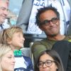Yannick Noah et son fils Joalukas (9 ans) assistent au match Psg-Montpellier au Parc des Princes à Paris, le 17 mai 201417/05/2014 - Paris