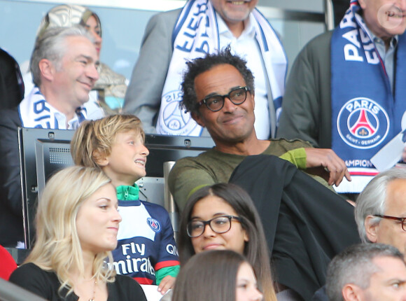 Yannick Noah et son fils Joalukas (9 ans) assistent au match Psg-Montpellier au Parc des Princes à Paris, le 17 mai 201417/05/2014 - Paris